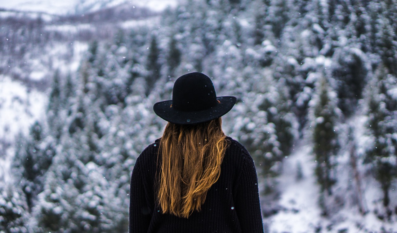 Woman wearing a black hat